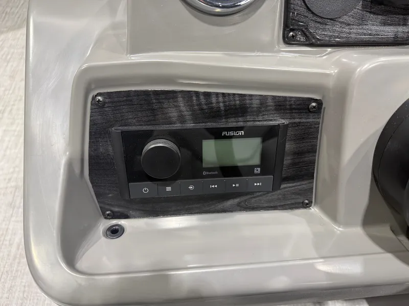 Slide: The Image of Fusion Bluetooth control on Tahoe Sport Quad Fish 1980 Pontoon 2026. - 15
