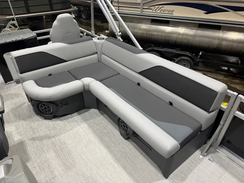 Slide: The Image of Interior of 2026 Tahoe Sport Quad Fish Pontoon with gray seating. - 26