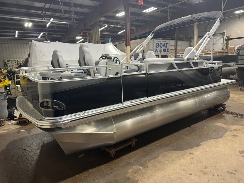 Slide: The Image of 2026 Tahoe Sport Quad Fish Pontoon in showroom. - 34