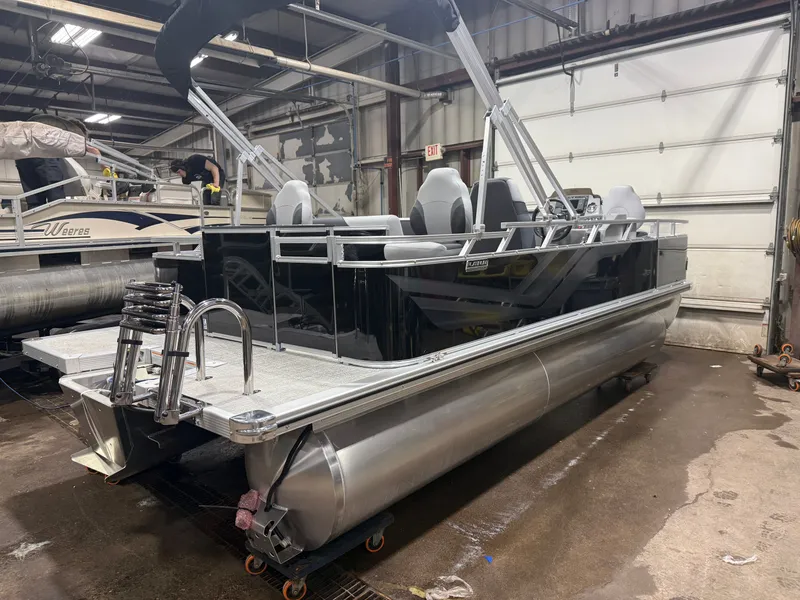 Slide: The Image of 2026 Tahoe Sport Quad Fish Pontoon indoors, priced at $30,995. - 40