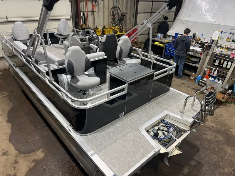 Slide: The Image of 2026 Tahoe Sport Quad Fish Pontoon in workshop, interior view. - 42