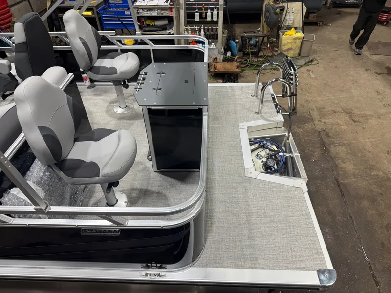 Slide: The Image of Interior of Tahoe Sport Quad Fish 1980 Pontoon, model year 2026. - 5