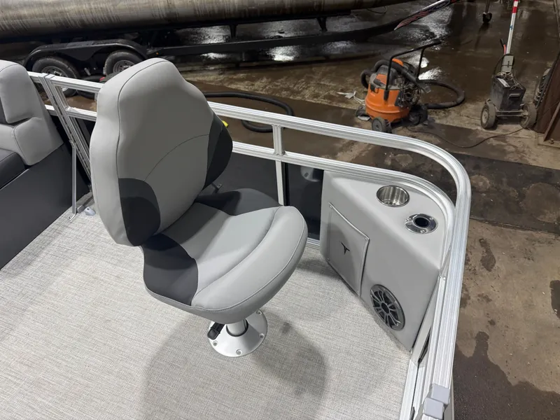 Slide: The Image of 2026 Tahoe Sport Quad Fish Pontoon seating area with speaker. - 9