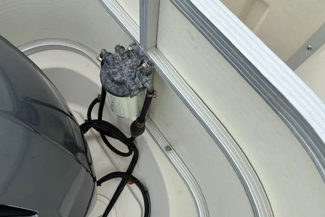 Slide: The Image of 2007 SouthWind 229 Deck Boat engine compartment with wiring and components. - 9