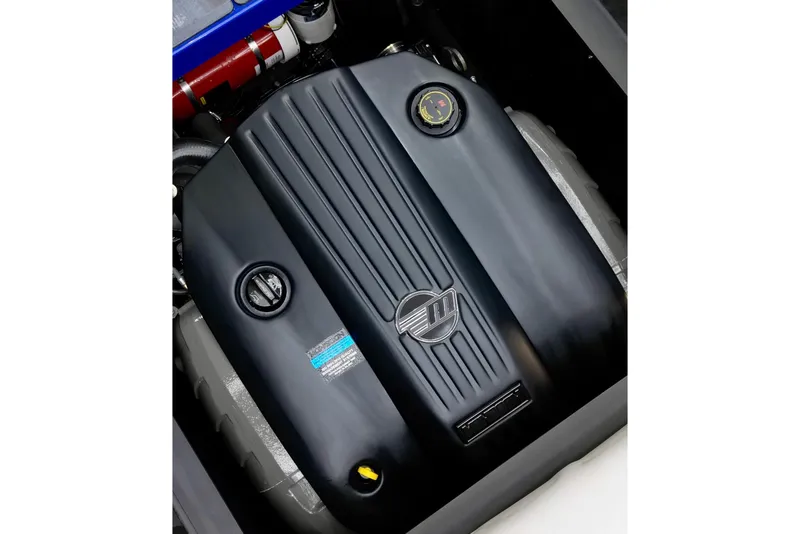 Slide: The Image of 2025 Axis T220 engine with sleek black cover and visible branding. - 12