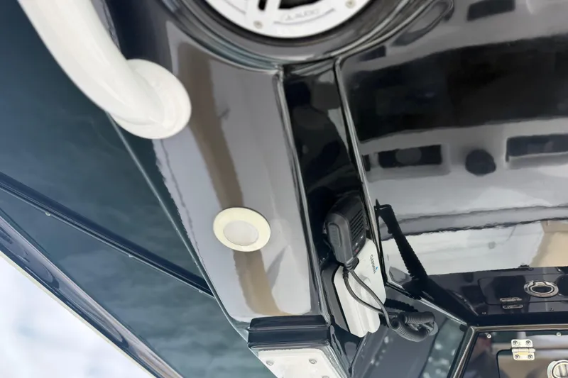 Slide: The Image of 2023 Sportsman Masters 267 Bay Boat interior with electronics and sleek design. - 24