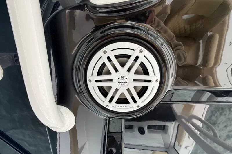 Slide: The Image of Close-up of JL Audio speaker on 2023 Sportsman Masters 267 Bay Boat. - 33