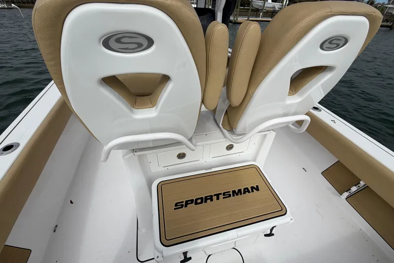 Slide: The Image of 2023 Sportsman Masters 267 Bay Boat interior with tan seating and logo. - 37