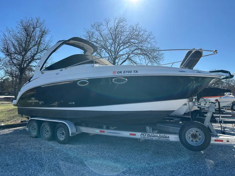 The Image of 2006 Chaparral 276 boat on trailer in sunny weather. - 1
