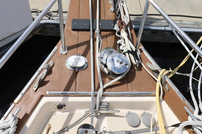 Slide: The Image of Bow of 1996 Island Packet 40 sailboat with ropes and winches. - 43