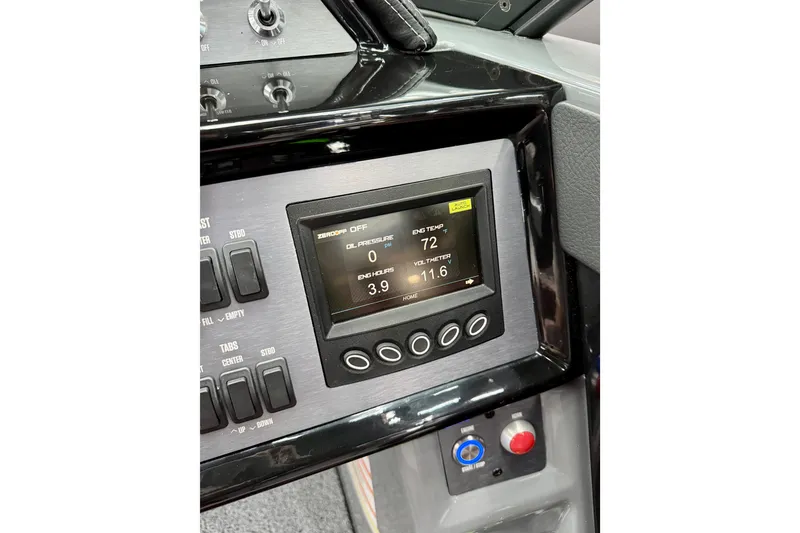 Slide: The Image of 2023 MasterCraft NXT24 dashboard display showing engine temperature and controls. - 9