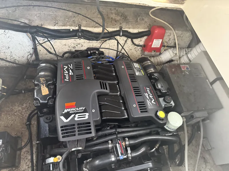 Slide: The Image of Engine compartment of 2000 Rinker Fiesta Vee 270 with Mercury V8 engine. - 10