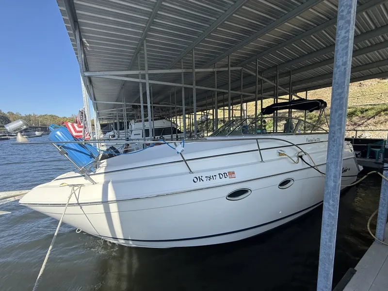 Slide: The Image of 2000 Rinker Fiesta Vee 270 boat docked in marina. - 17