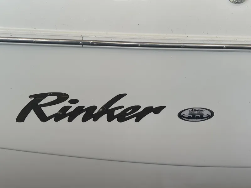 Slide: The Image of Rinker Fiesta Vee 270 boat, year 2000, logo view. - 19