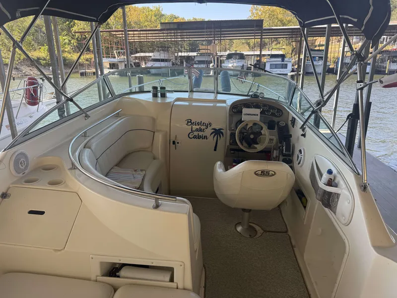 Slide: The Image of Interior of a 2000 Rinker Fiesta Vee 270 boat at the dock. - 3
