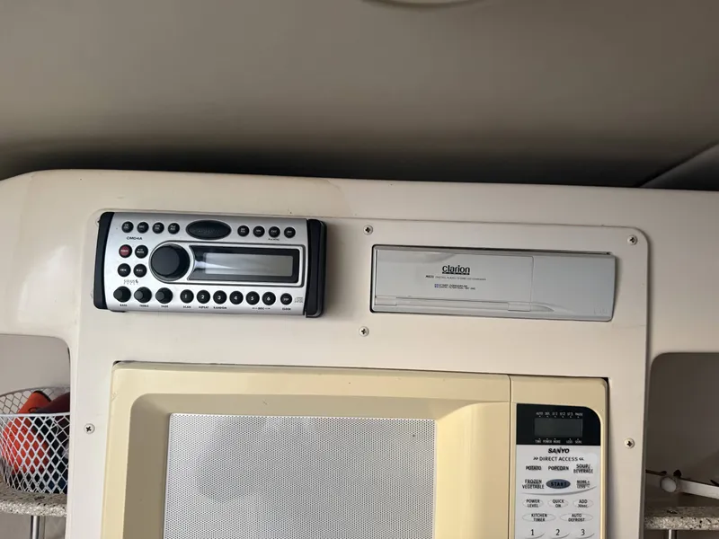 Slide: The Image of Interior of Rinker Fiesta Vee 270 with stereo system and microwave. - 9