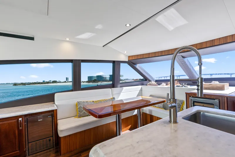 Slide: The Image of Luxurious interior of 2013 Hatteras 60 Motor Yacht with ocean view and modern amenities. - 17