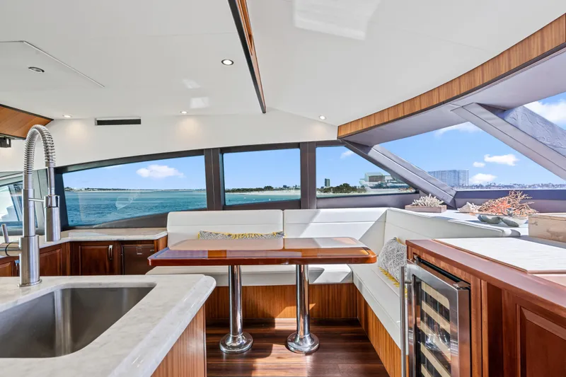 Slide: The Image of Luxurious interior of 2013 Hatteras 60 Motor Yacht with ocean view and modern amenities. - 18