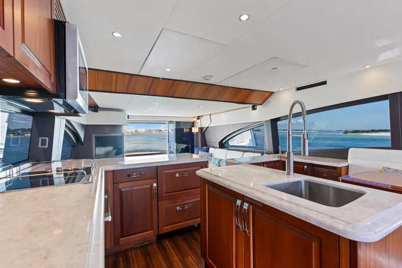 Slide: The Image of Luxurious kitchen interior of 2013 Hatteras 60 Motor Yacht with ocean view. - 19