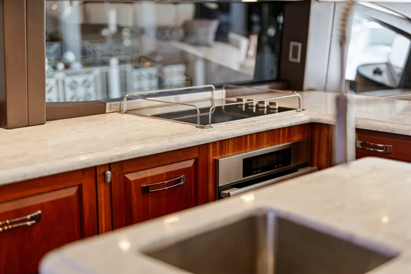 Slide: The Image of Luxurious kitchen interior of 2013 Hatteras 60 Motor Yacht with modern appliances. - 24