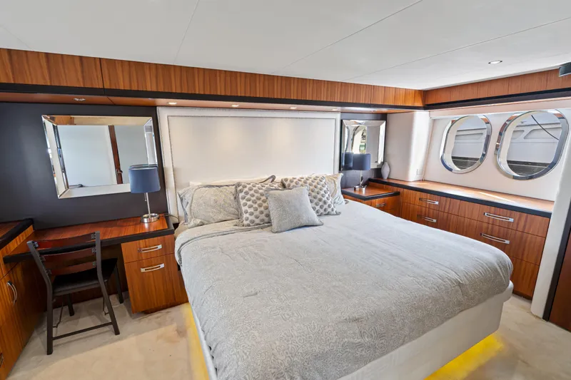Slide: The Image of Luxurious bedroom interior of 2013 Hatteras 60 Motor Yacht with elegant wood finishes. - 37