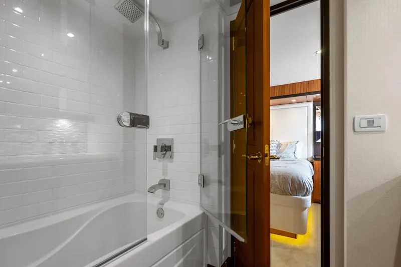 Slide: The Image of Luxurious bathroom and bedroom interior on 2013 Hatteras 60 Motor Yacht. - 41