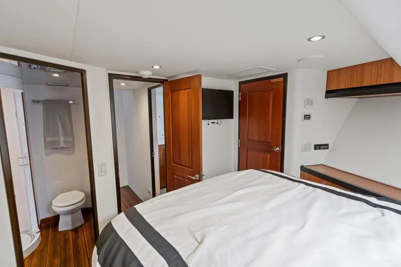 Slide: The Image of Luxurious bedroom and bathroom interior of 2013 Hatteras 60 Motor Yacht. - 45