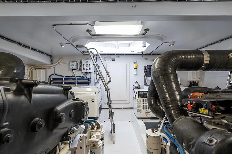 Slide: The Image of Engine room of 2013 Hatteras 60 Motor Yacht with visible machinery and equipment. - 73