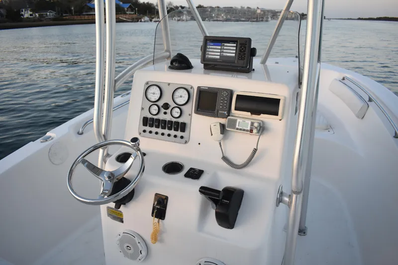 Slide: The Image of Center console of a 2007 Tidewater 216 CC Adventure boat with navigation equipment. - 18