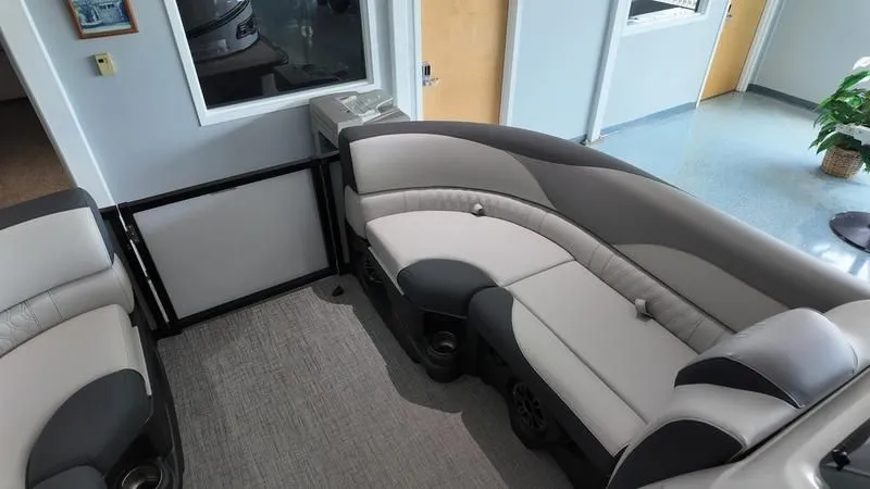 Slide: The Image of Interior of 2025 Avalon LSZ with sleek gray seating. - 12