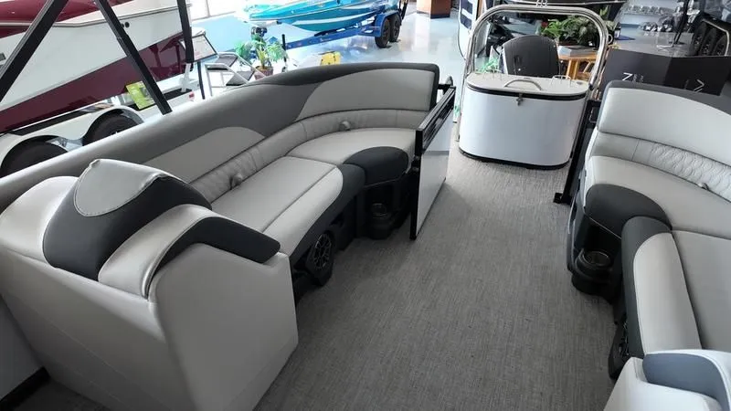 Slide: The Image of Interior of 2025 Avalon LSZ pontoon boat with luxurious seating. - 13