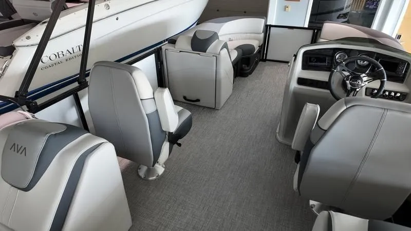 Slide: The Image of Interior of 2025 Avalon LSZ with modern seating and helm console. - 22