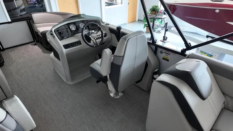 Slide: The Image of Interior of 2025 Avalon LSZ with modern helm and luxurious seating. - 32