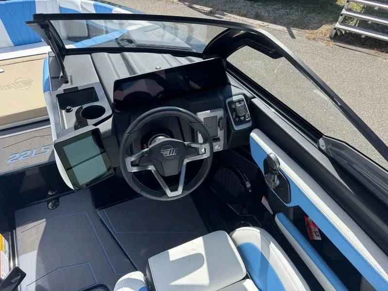 Slide: The Image of Interior of 2026 Malibu Wakesetter 22 LSV with modern controls. - 12