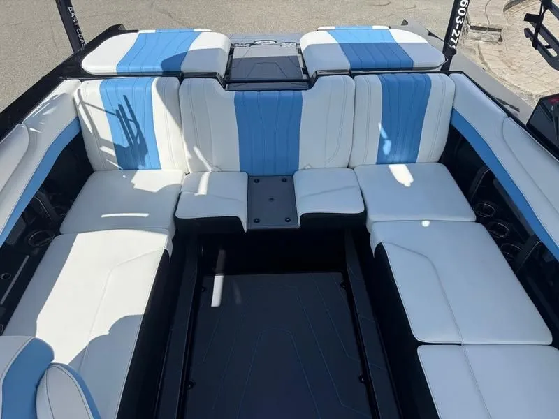 Slide: The Image of Interior of 2026 Malibu Wakesetter 22 LSV with blue and white seating. - 14