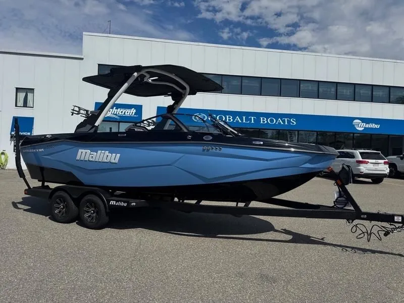 Slide: The Image of 2026 Malibu Wakesetter 22 LSV boat outside Cobalt Boats building. - 4