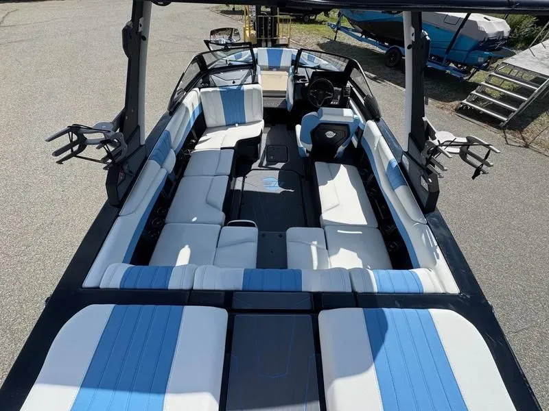 Slide: The Image of Interior of 2026 Malibu Wakesetter 22 LSV with blue and white seating. - 9