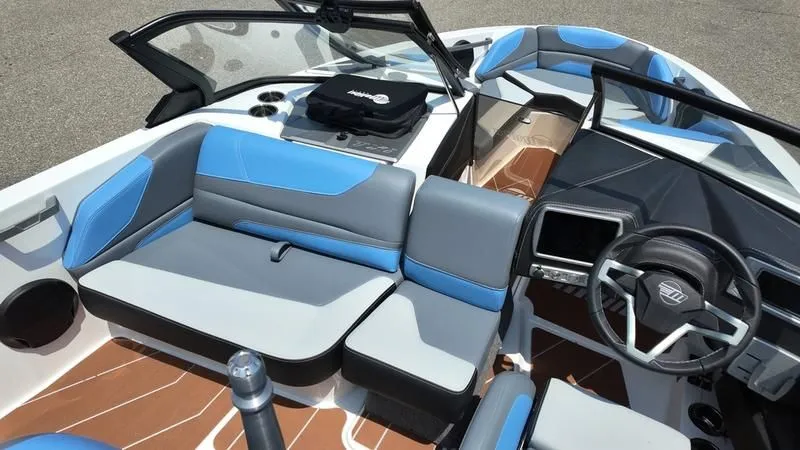 Slide: The Image of Interior of 2025 Malibu TXi with blue and gray seating. - 14