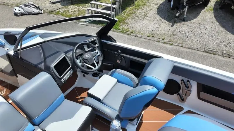 Slide: The Image of Interior of 2025 Malibu TXi featuring modern design and blue accents. - 15