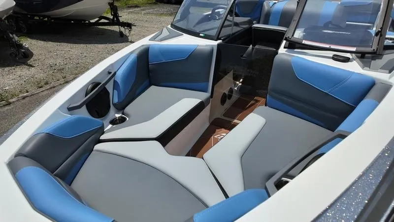 Slide: The Image of Interior of 2025 Malibu TXi with blue and gray seating. - 18