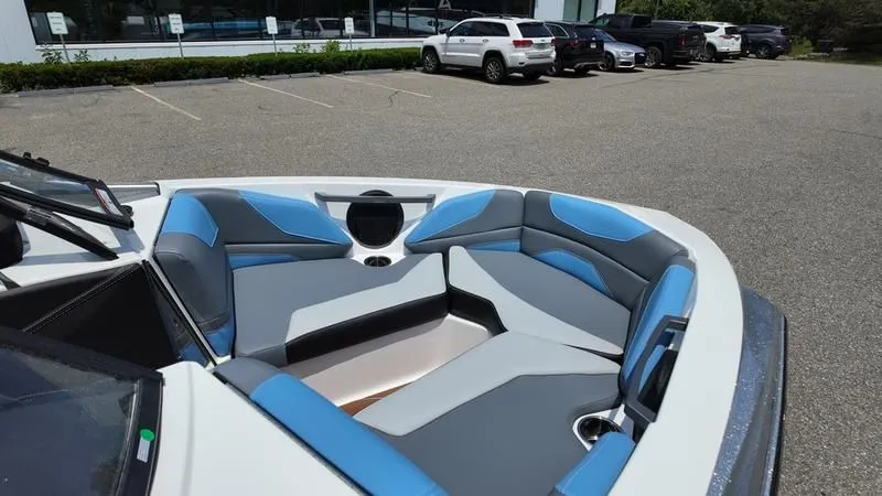 Slide: The Image of Interior of 2025 Malibu TXi with blue and gray seating. - 19