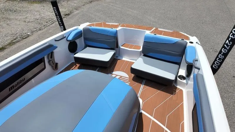 Slide: The Image of Interior of 2025 Malibu TXi with blue and gray seating. - 7