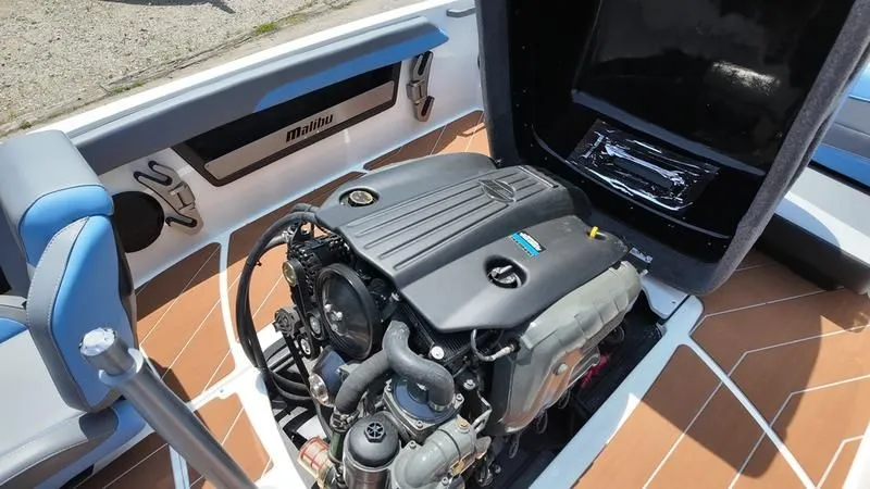 Slide: The Image of 2025 Malibu TXi engine compartment with open motor. - 8