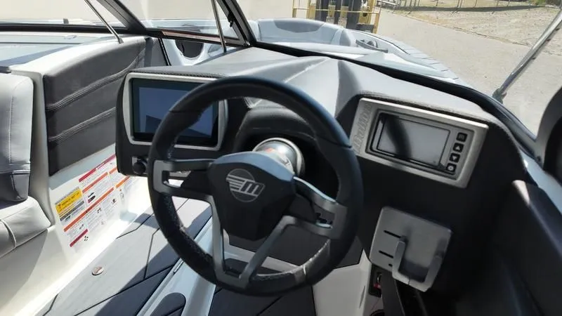 Slide: The Image of Interior of 2025 Malibu TXi with modern dashboard and steering wheel. - 16