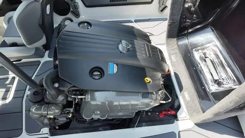 Slide: The Image of 2025 Malibu TXi engine compartment with open cover. - 21