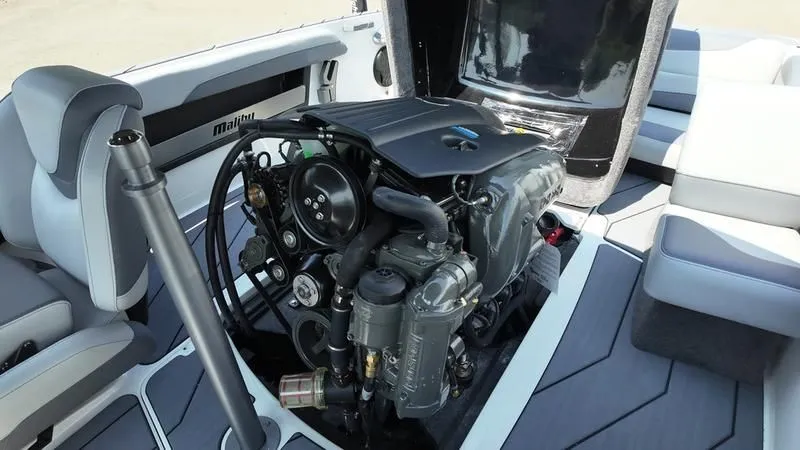 Slide: The Image of 2025 Malibu TXi engine compartment with exposed motor. - 26