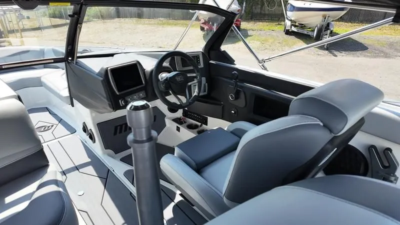 Slide: The Image of Interior of 2025 Malibu TXi featuring modern design and control console. - 34
