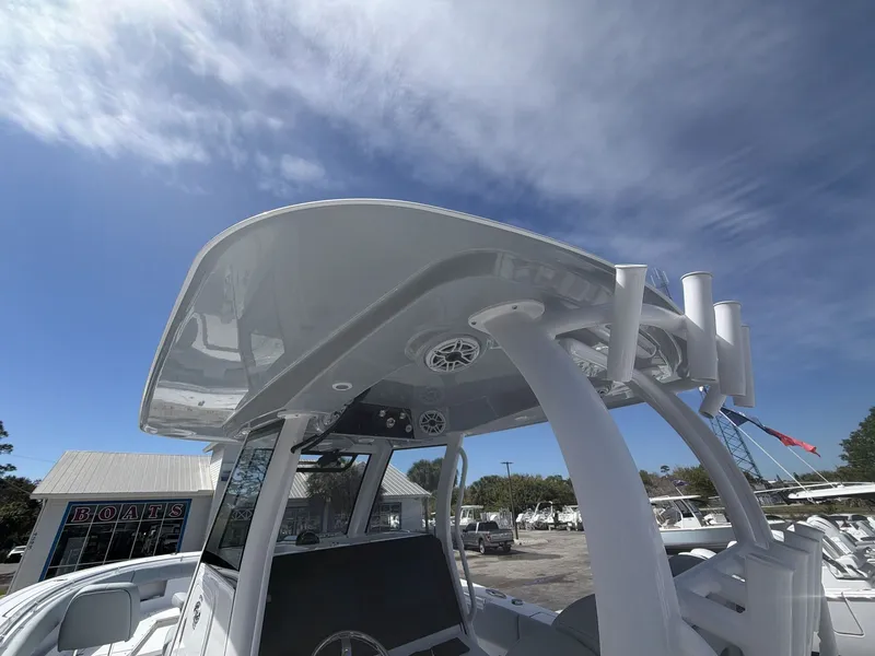 Slide: The Image of Sportsman Open 322 Center Console 2026 with T-top and speakers. - 11