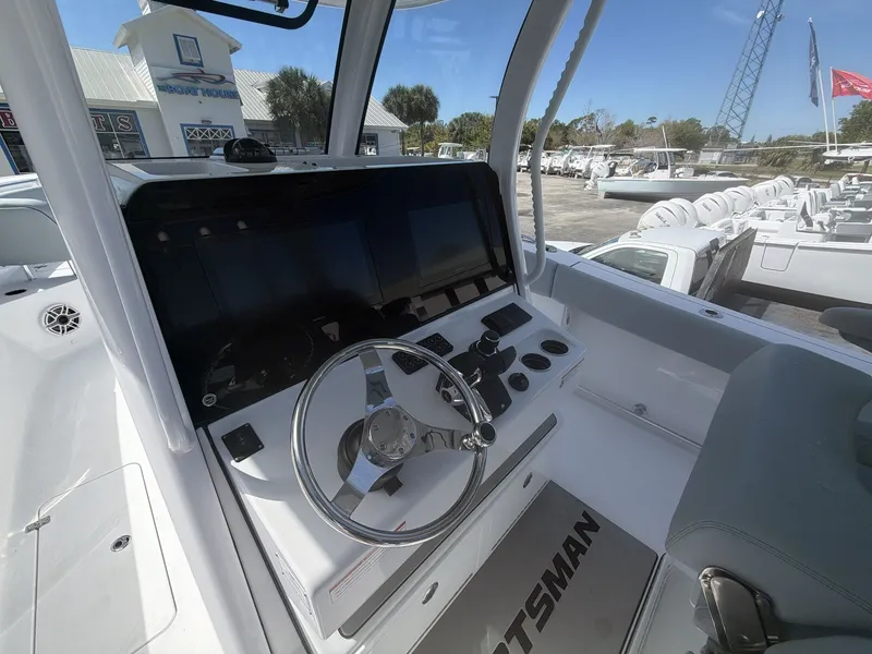 Slide: The Image of Interior view of Sportsman Open 322 Center Console 2026 boat. - 19