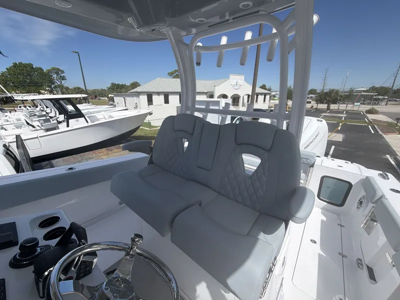 Slide: The Image of 2026 Sportsman Open 322 Center Console boat interior view. - 21